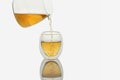 Tea pouring into Double-wall Glass Tea Cup Royalty Free Stock Photo