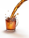 Tea pouring into a glass mug splashing. Royalty Free Stock Photo