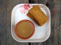 Tea and rusk in white plate Royalty Free Stock Photo