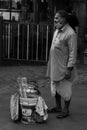 A tea seller waiting for customers