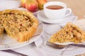 Tea served with rhubarb crumble tart Royalty Free Stock Photo