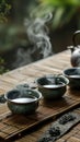 Tea Set on Bamboo Mat With Smoke Rising
