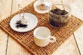 Tea set with hot water in cup on wooden table Royalty Free Stock Photo