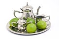 Tea set and limes Royalty Free Stock Photo