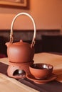 A tea set made of a teapot and cup made of clay. Tea ceremony Royalty Free Stock Photo