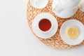 Tea set in a minimalistic Scandinavian style. White dishes on an isolated background. View from above