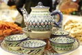 Tea set, teapot, cups, painted Turkish ceramics, sweets and dried fruits