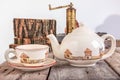 Tea set with teapot on wooden table Royalty Free Stock Photo