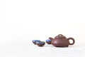 tea set view, Chinese teapot, cups on a white background .