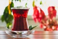 Tea in small cup on table