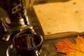 Tea still life with samovar, maple leaves, on wooden background. Empty open an old vintage book. Royalty Free Stock Photo