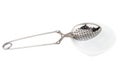 Tea strainer on a chain isolated white background. Royalty Free Stock Photo