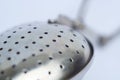 Tea strainer macro Royalty Free Stock Photo
