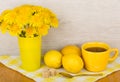 Tea with sugar and lemon, bouquet of flowers Royalty Free Stock Photo