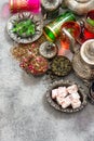 Tea table place setting colorful glasses. Oriental hospitality