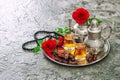 Tea table setting red rose flowers Islamic holidays decoration Royalty Free Stock Photo