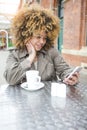 Tea and Texting Royalty Free Stock Photo