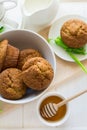 Tea time: homemade banana muffins, honey, bananas and tea settings Royalty Free Stock Photo