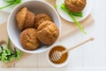 Tea time: homemade banana muffins, honey, bananas and tea settings Royalty Free Stock Photo