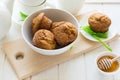 Tea time: homemade banana muffins, honey, bananas and tea settings Royalty Free Stock Photo