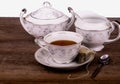 Top view of tea time trio with teacup, creamer and sugar bowl Royalty Free Stock Photo