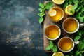 tea time trends, green tea cups on a rustic plank with mint leaves and lemon slices, creating a tranquil scene Royalty Free Stock Photo