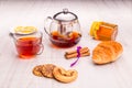 Tea in a transparent cup, cinnamon and oat cookie Royalty Free Stock Photo