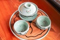 Tea Tray, gaiwan and two bowls. Set of porcelain dishes for Chinese tea ceremony Royalty Free Stock Photo