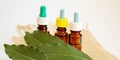 Tea tree essential oil in a small bottle. Selective focus Royalty Free Stock Photo