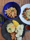 Aesthetic caffe food there are rice carbonara with mushroom, mie ayam and grilled chicken with fried rice