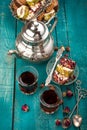 Tea and turkish delight on wooden background Royalty Free Stock Photo