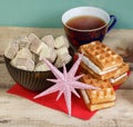 Tea, waffles, biscuits and Christmas star
