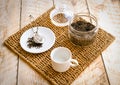 Tea on wicker mat at home wodden table backround Royalty Free Stock Photo