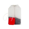 Teabag with red label isolated on a white Royalty Free Stock Photo