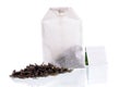 Teabag with white label and tea loose Royalty Free Stock Photo