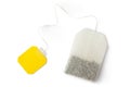 Teabag with yellow label. Top view. Royalty Free Stock Photo