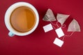 Teabags with label. Top view, on a red background. Mockup Royalty Free Stock Photo