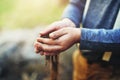 Teach kids the value of caring for nature. Closeup shot of a little boy holding soil in his hands.