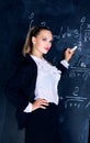 Teacher against a chalkboard Royalty Free Stock Photo