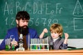 Teacher bearded scientist man child test tubes. Chemical experiment. Genius child private lesson. Knowledge day. Genius