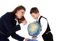 Teacher and boy with globe Royalty Free Stock Photo