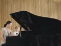 Teacher And Boy Playing Piano In Music Class Royalty Free Stock Photo