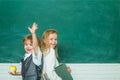 Teacher and child. Back to school. Cute little preschool kid boy with Little child girl in a classroom. Ready for school Royalty Free Stock Photo