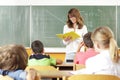 Teacher In Classroom Royalty Free Stock Photo