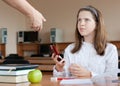 Teacher is confiscating mobile phone at lesson