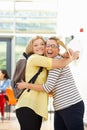 Teacher Congratulating Pupil On Successful Exam Result Royalty Free Stock Photo