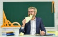 Teacher destroying paper file. Study hard. School education for everyone. Modern education requirements. Private school Royalty Free Stock Photo