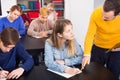 Teacher explaining difficult problem to student Royalty Free Stock Photo