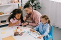 teacher in eyeglasses and multiracial children Royalty Free Stock Photo