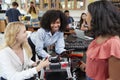 Teacher With Female Pupils Building Robotic Vehicle In Science Lesson Royalty Free Stock Photo